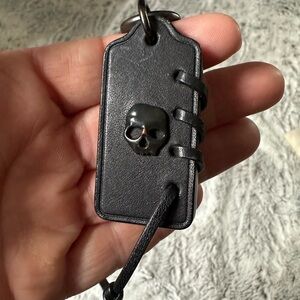 Black leather skull COACH keychain